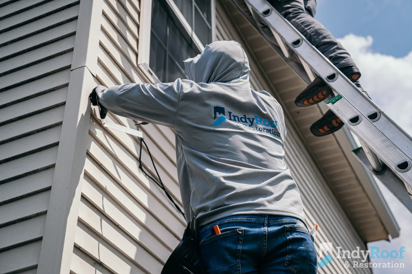Storm-damaged siding documented in Station Hill